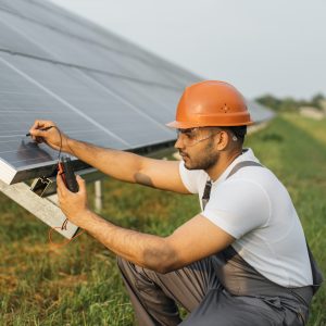 technician-measuring-amperage-of-solar-panels.jpg